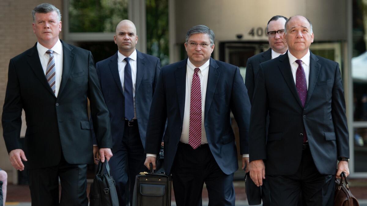 Attorneys for Paul Manafort, including Kevin Downing, from left, Jay Nanavati, Richard Westling, Brian Ketcham and Thomas Zehnle, arrive in federal court in Virginia last August.