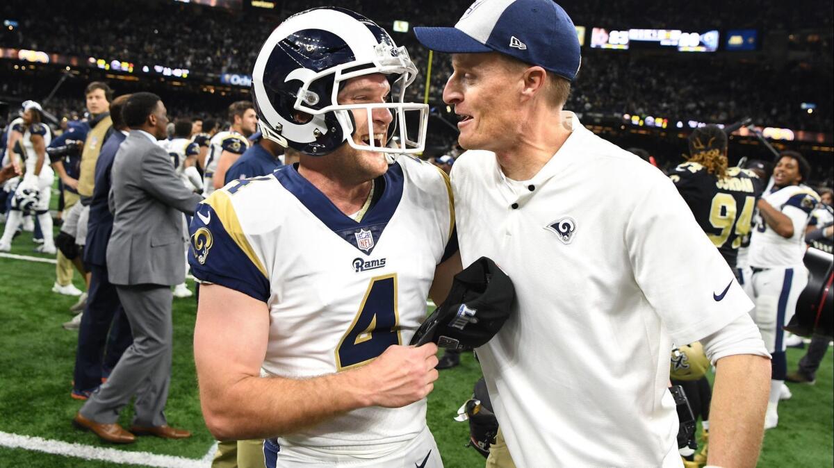 Rams kicker Greg Zuerlein celebrates his game-winning field goal with special teams coach John Fassel in the NFC Championship game on Sunday in New Orleans.