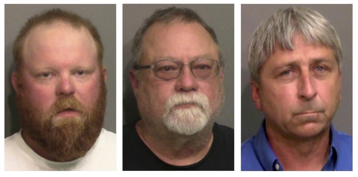 FILE - This combo of booking photos provided by the Glynn County, Ga., Detention Center, shows from left, Travis McMichael, his father Gregory McMichael, and William "Roddie" Bryan Jr. Legal experts say federal hate crimes charges in the 2020 chase and killing of Ahmaud Arbery could prove more difficult to prosecute than the fall murder trial that ended in convictions of three white men. Jury selection is scheduled to begin Monday, Feb. 7, 2022 in U.S. District Court in Brunswick, Georgia.(Glynn County Detention Center via AP, File)