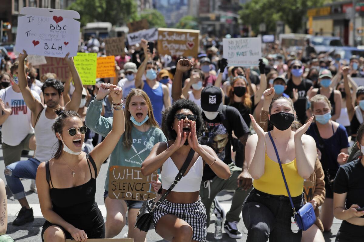 Protesters, many of them young people, march through the streets of Manhattan on June 7.