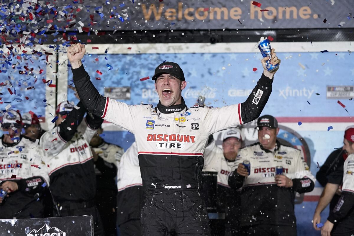 Austin Cindric celebrates in Victory Lane after winning the NASCAR Daytona 500.