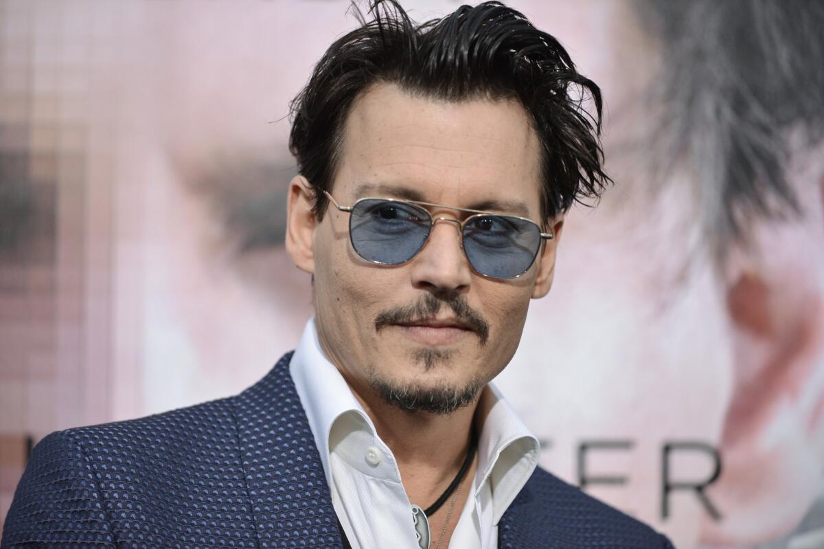Johnny Depp at the Los Angeles premiere of "Transcendence."