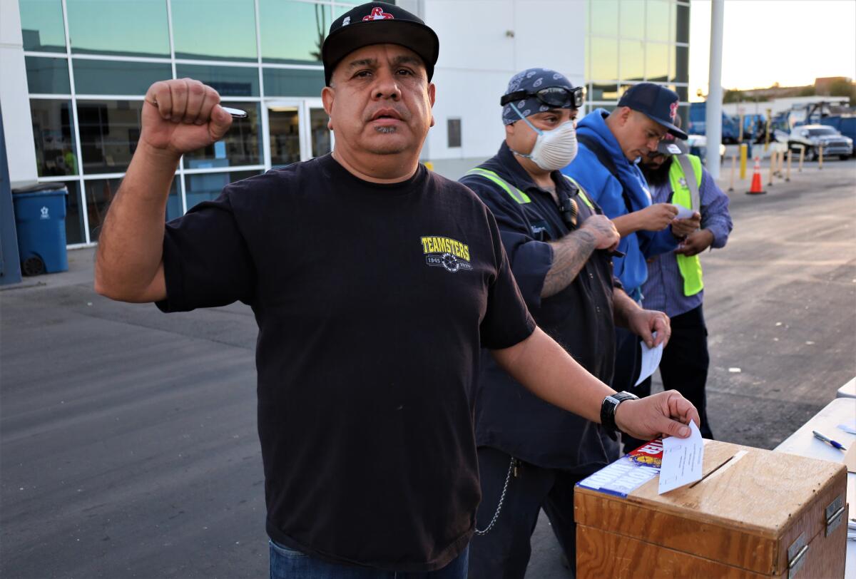 A worker at Republic Services in Anaheim on Nov. 23, where members of Teamsters Local 396 voted to authorize a strike.