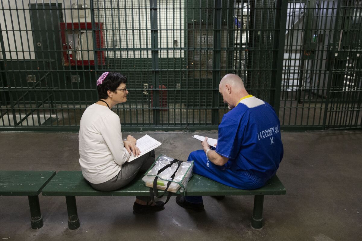 Avivah Erlick, a Jewish chaplain, visits inmates at Men's Central Jail in downtown Los Angeles.