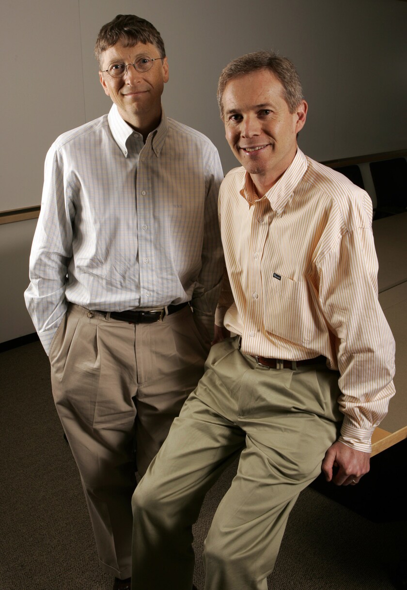 Microsoft Chairman Bill Gates, left, is pictured with Blair Westlake, Microsoft's vice president of media and entertainment. Westlake has announced he is leaving the software company.