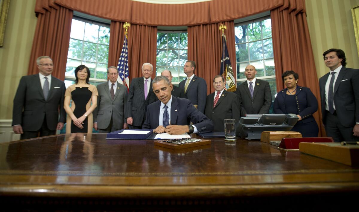 It's hard for one party to keep the White House for a third term, as Hillary Clinton is trying to do. Above, President Barack Obama at work in the Oval Office on May 11.