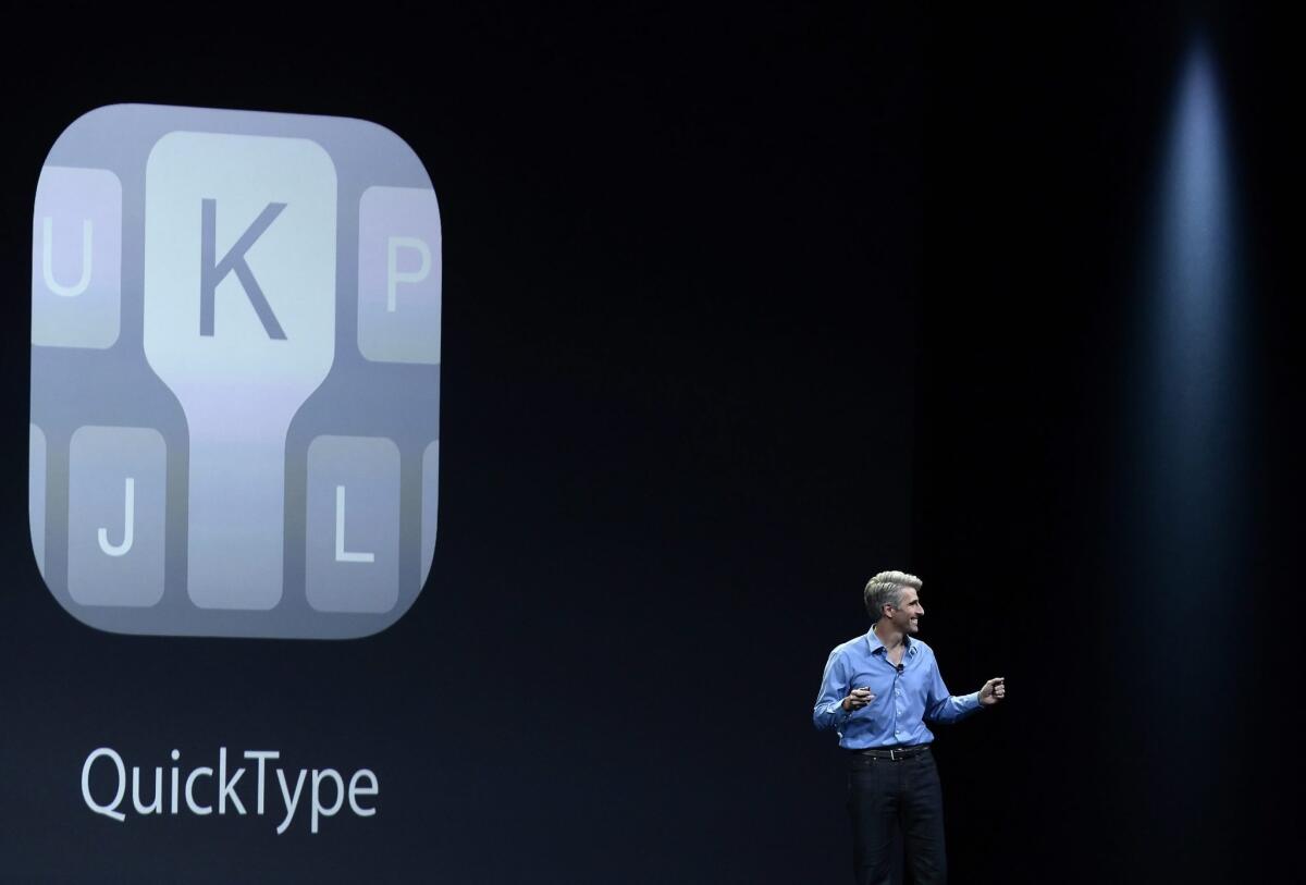 Craig Federighi, Apple's senior vice president of software engineering, talks about QuickType, an upcoming iOS 8 feature that should improve typing on the iPhone and iPad, at the Apple Worldwide Developers Conference in San Francisco.