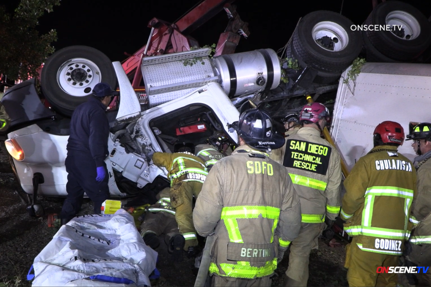The driver of a big-rig that overturned in Otay Mesa was extricated from the wreck early Tuesday.