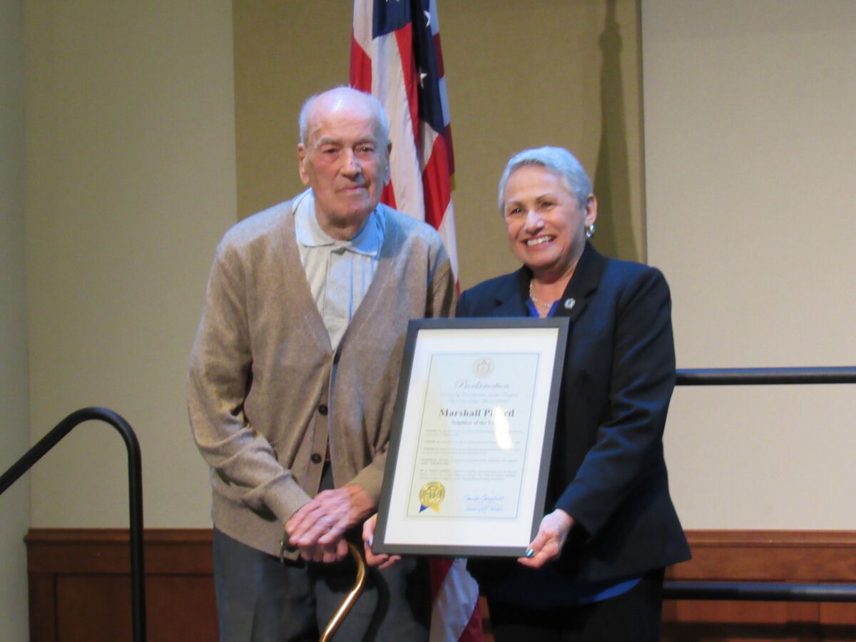 Marshall Picard is honored for the breadth of his volunteer work at The Orchard.