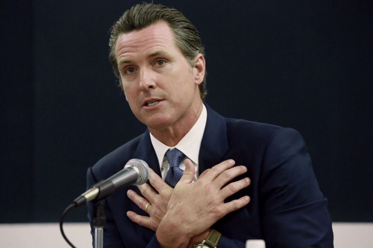 Gov. Gavin Newsom, shown here in a 2015 file photograph, signed an executive order this week directing that hearings for juvenile offenders in state custody be held by telephone or videoconference whenever possible to help curb the spread of COVID-19.