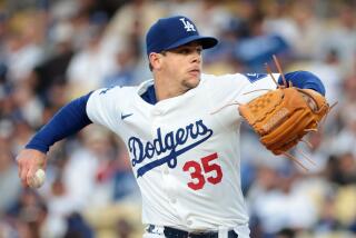 LOS ANGELES, CALIFORNIA May 21, 2024-Dodgers pitcher Gavin Stone throws a pitch.