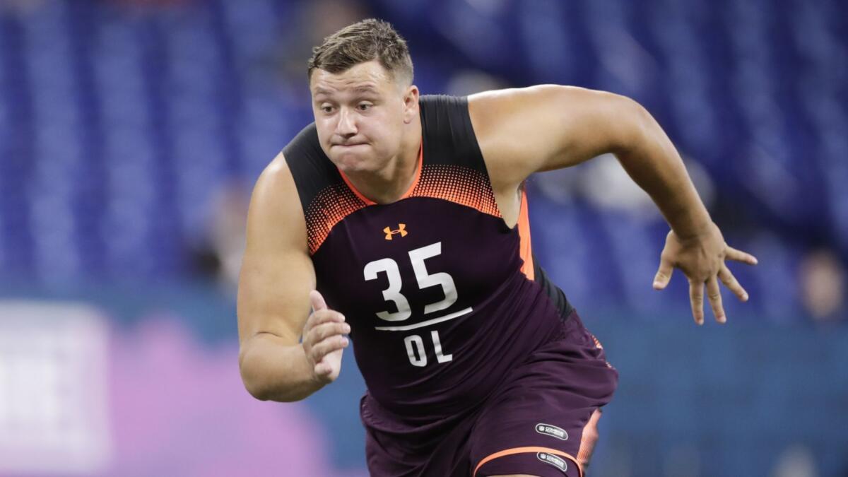 Boston College offensive lineman Chris Lindstrom runs a drill at the NFL scouting combine.