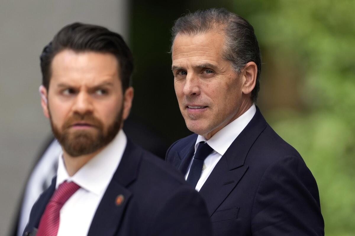 Hunter Biden, right, departs from federal court, Monday, June 10, 2024, in Wilmington, Del. 