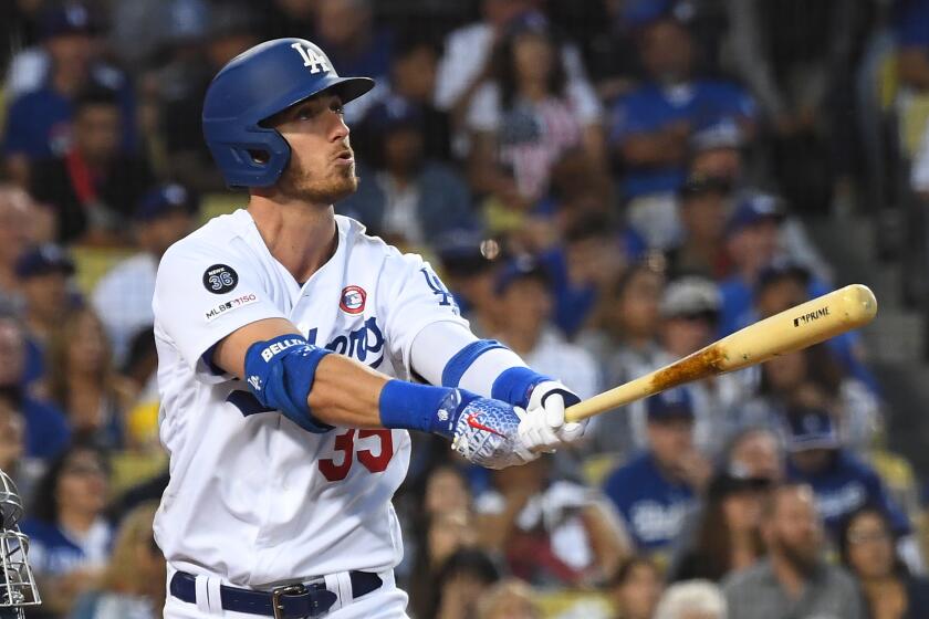 LOS ANGELES, CA - JULY 04: Cody Bellinger #35 of the Los Angeles Dodgers hits a solo home run in the sixth inning off the game against the San Diego Padres at Dodger Stadium on July 4, 2019 in Los Angeles, California. (Photo by Jayne Kamin-Oncea/Getty Images)