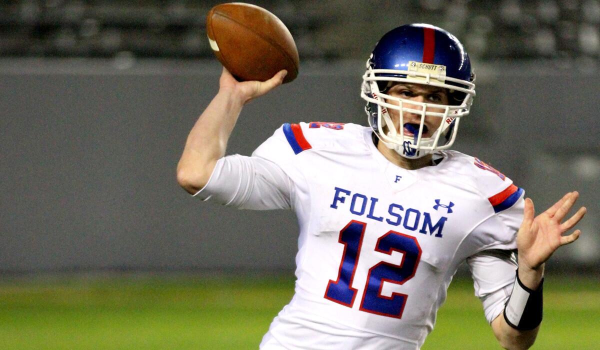 Folsom quarterback Jake Browning finds a target during the CIF Division I state bowl game on Friday night at StubHub Center.