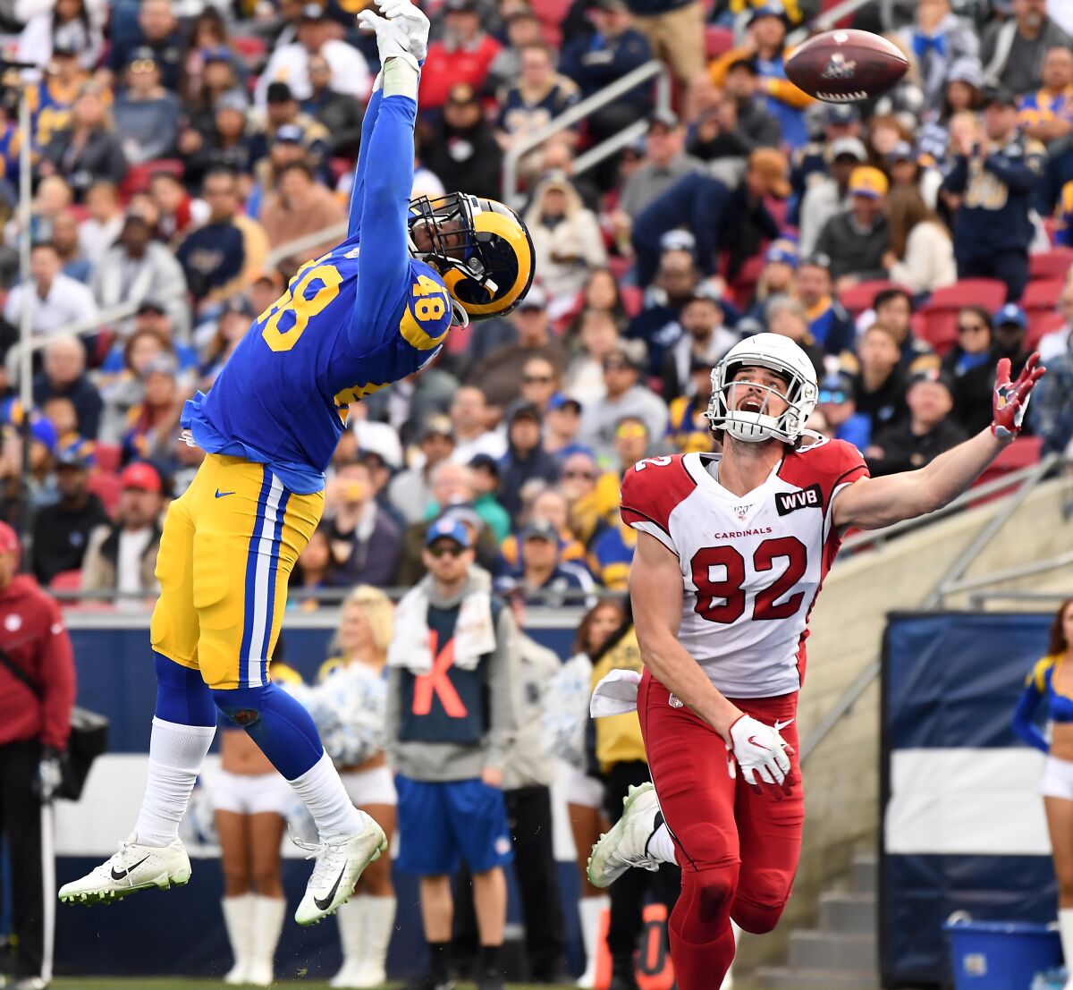 Rams linebacker Travin Howard deflects a pass in the end zone against the Cardinals last season.