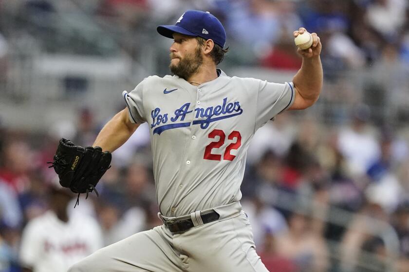 Los Angeles Dodgers starting pitcher Clayton Kershaw delivers in the first inning of a baseball game.