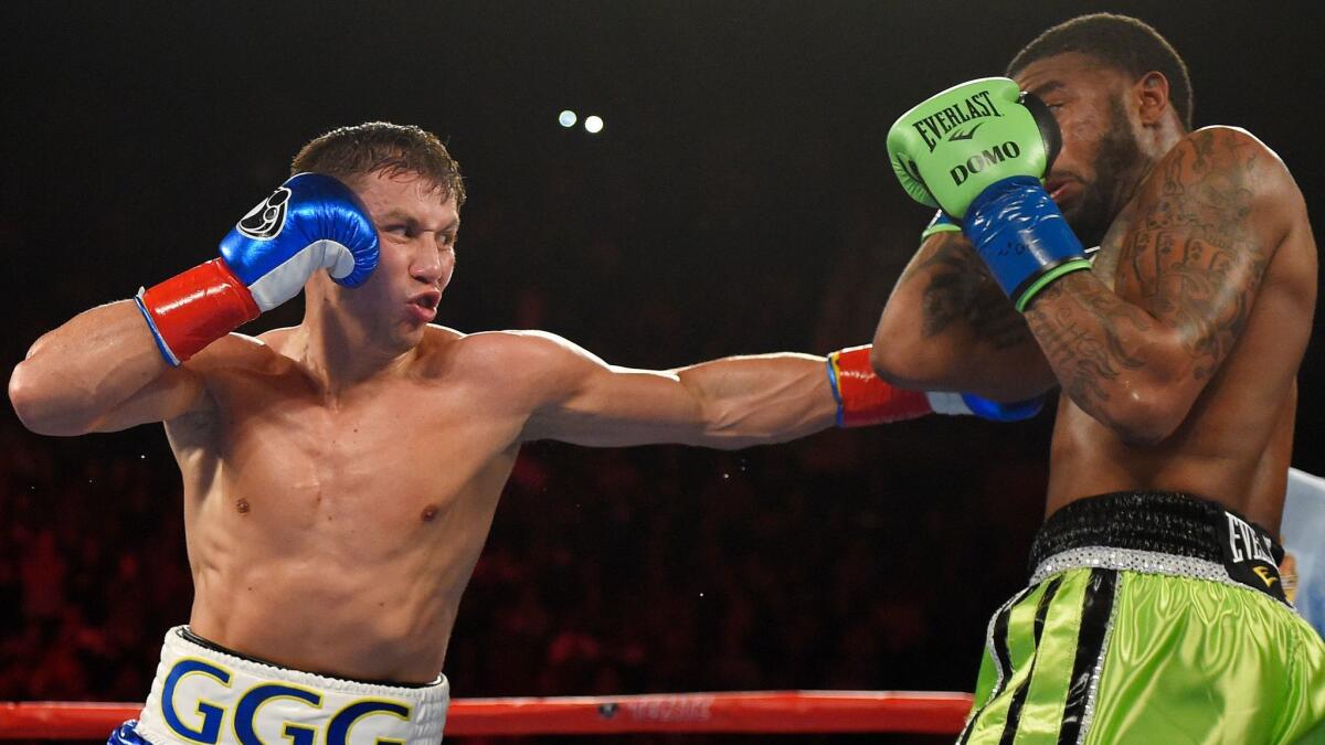 Gennady Golovkin, left, connects with Dominic Wade on April 23.