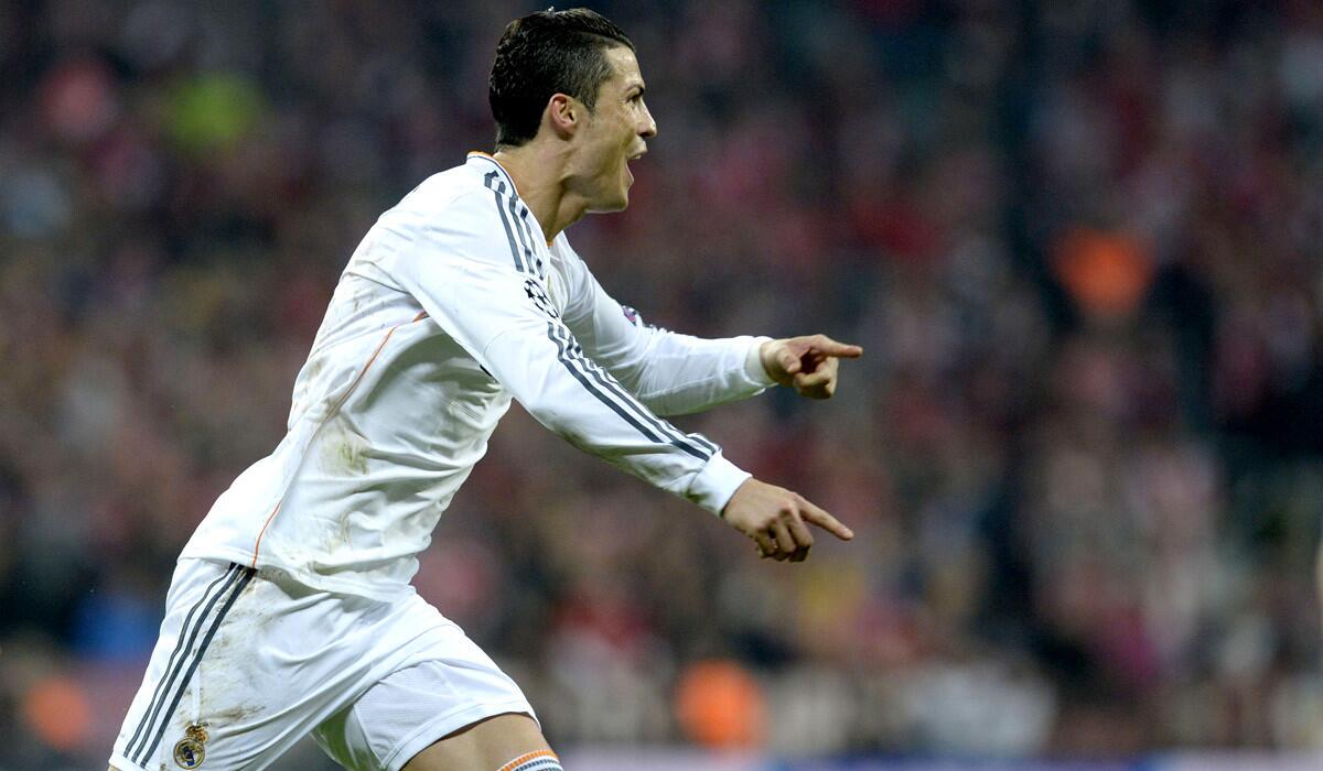 Cristiano Ronaldo celebrates after scoring in Real Madrid's 4-0 victory over Bayern Munich in a Champions League semifinal game.