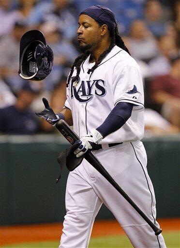 Boston Red Sox Manny Ramirez reacts after striking out in the