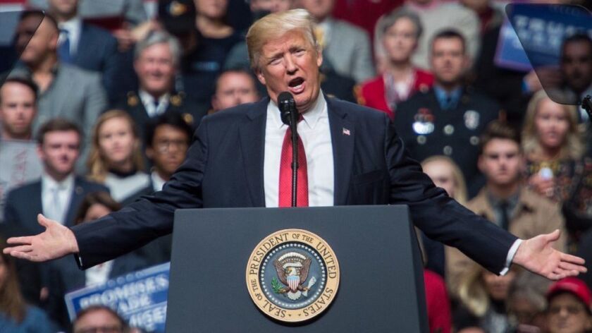 US President Donald Trump speaks during a rally in Nashville, Tennessee on March 15, 2017. Trump vows to challenge travel ban block at Supreme Court if needed he said during the rally.