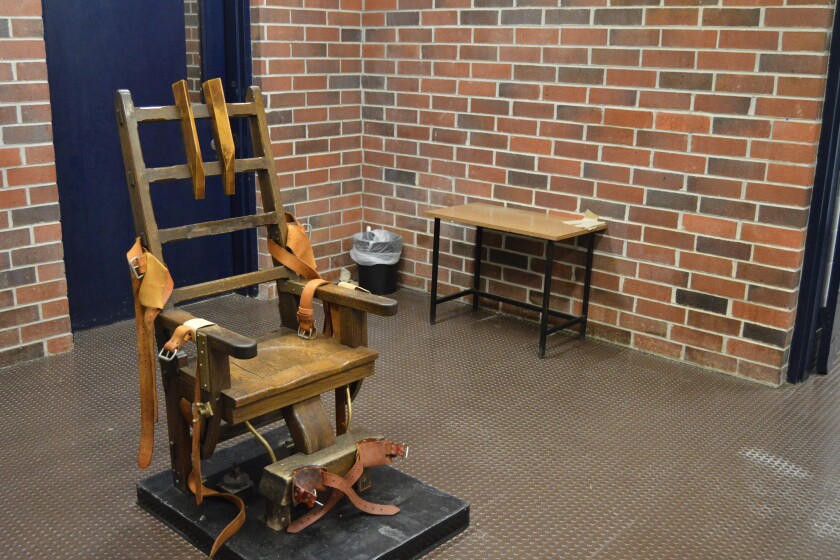 FILE - This March 2019, file photo, provided by the South Carolina Department of Corrections shows the state's electric chair in Columbia, S.C. South Carolina House members may soon debate whether to restart the state's stalled death penalty with the electric chair and whether to add a firing squad to the execution methods. The state's House Judiciary Committee approved a bill Tuesday, April 27, 2021, that would let condemned inmates choose death by being shot in the heart by several sharpshooters. (Kinard Lisbon/South Carolina Department of Corrections via AP, File)