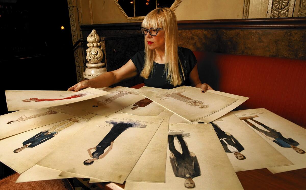 Catherine Martin, costume designer for "The Great Gatsby," looks at original costume sketches for the film at the Chateau Marmont. She has earned two Academy Awards, for art direction and costume design on "Moulin Rouge!"