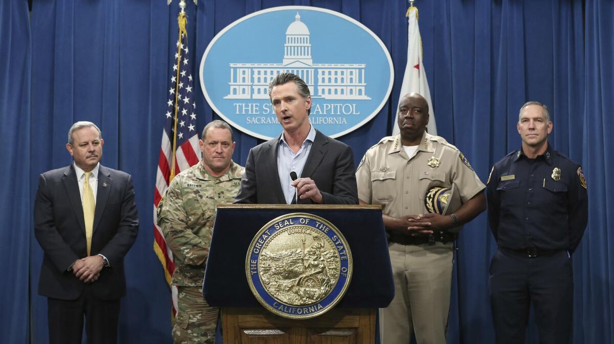 Gov. Gavin Newsom discusses his decision to withdraw several hundred National Guard troops from the nation's southern border in Sacramento, Calif. on Feb. 11.