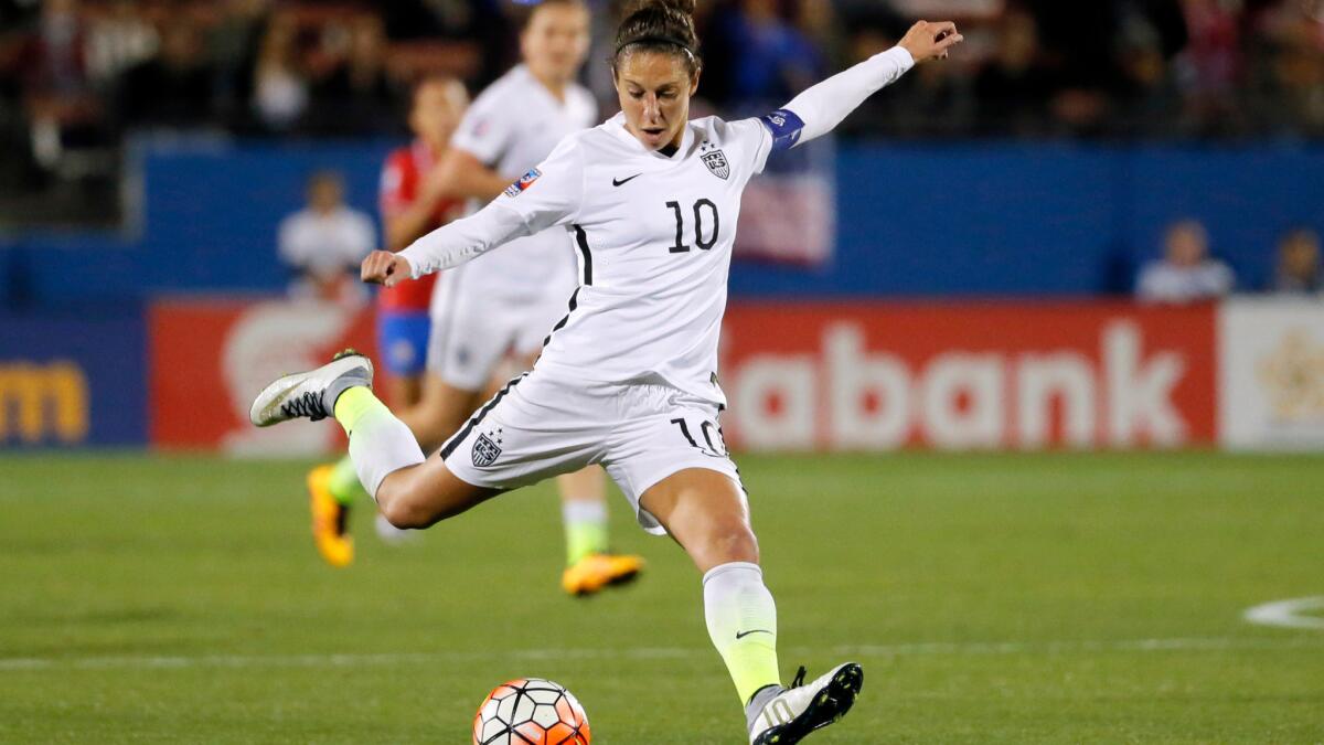 Carli Lloyd takes a shot at the Costa Rica goal during a CONCACAF Olympic qualifying match in Frisco, Texas, on Feb. 10, 2016.