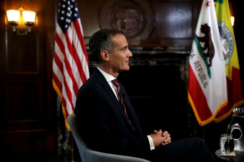 LOS ANGELES, CA - JULY 09: Los Angeles Mayor Eric Garcetti holds interviews with the media after President Joe Biden selected him as his nomination for U.S. Ambassador to India, pending Senate confirmation, at City Hall on Friday, July 9, 2021 in Los Angeles, CA. (Gary Coronado / Los Angeles Times)