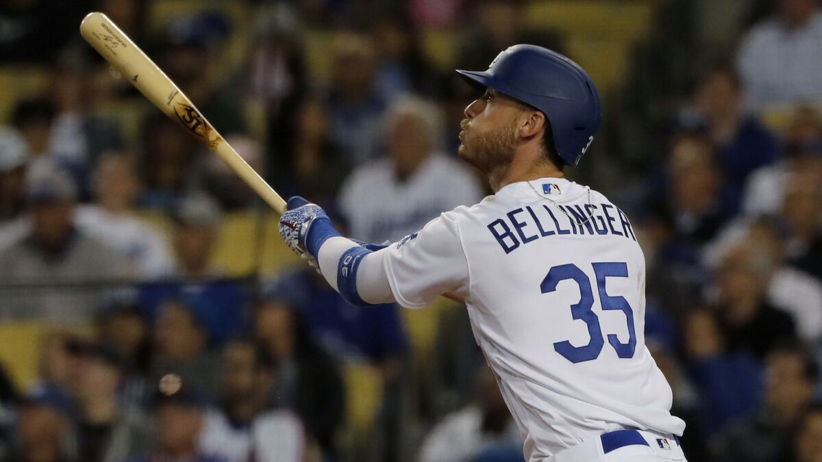 Dodgers right fielder Cody Bellinger hits a two-run homer against the New York Mets in the third inning on Tuesday at Dodger Stadium.