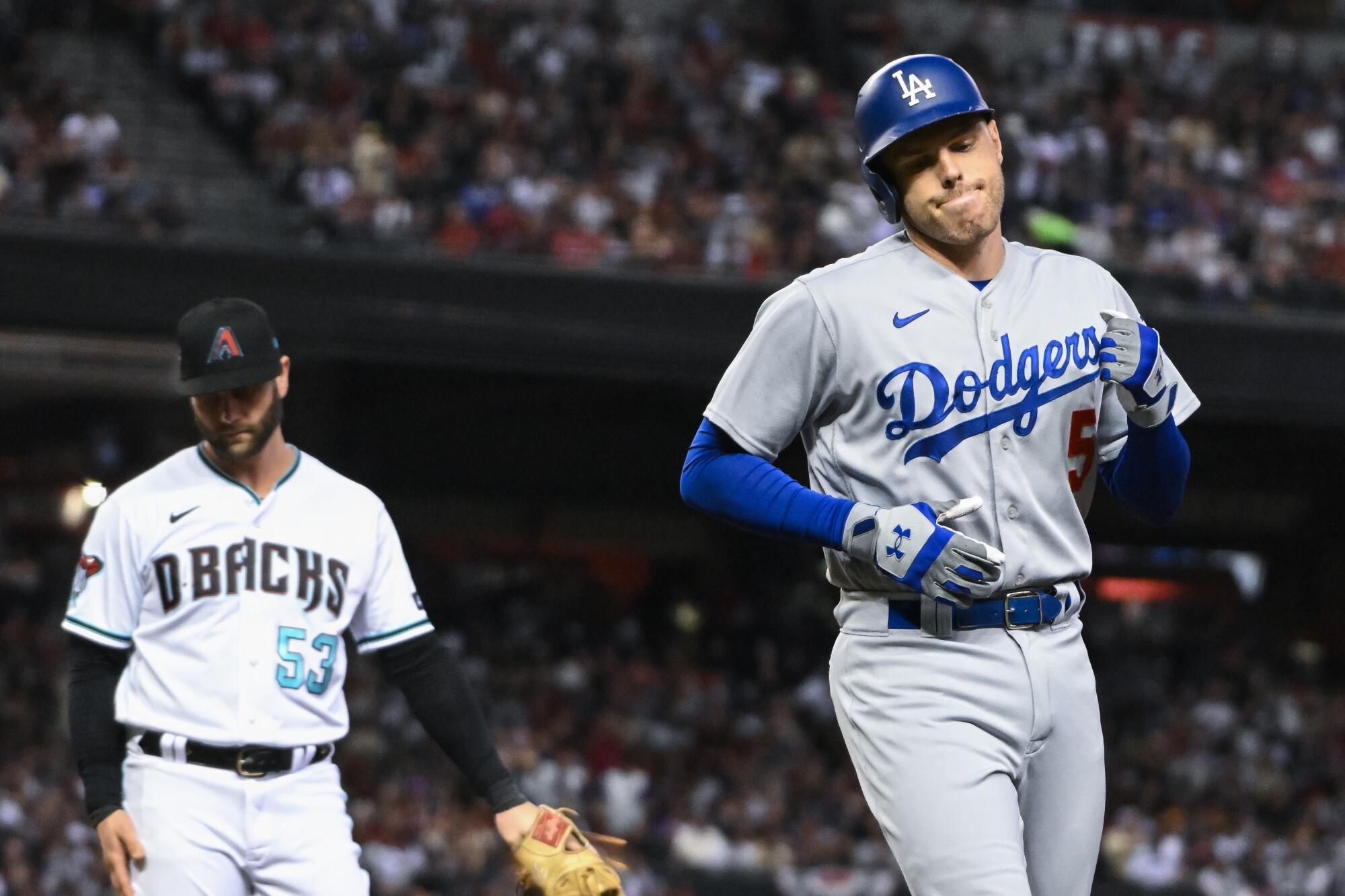 Freddie Freeman heads back to the Dodgers dugout after an out in Game 3 of the NLDS.
