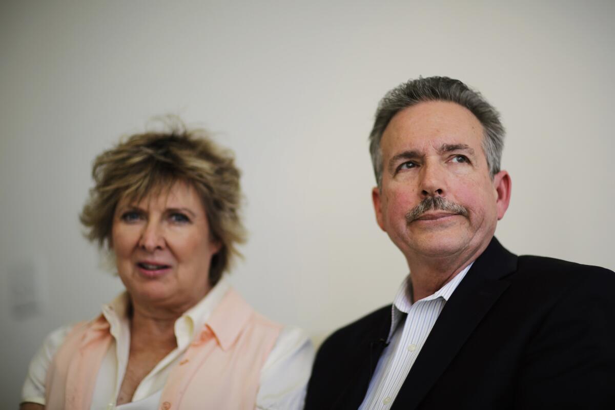 Richard Jones, right, sits next to wife Elizabeth as they sit in their attorney's office while talking about their daughter Sarah Jones, the 27-year-old camera assistant killed Feb. 20 by a freight train while filming a movie in southeast Georgia, in Atlanta.