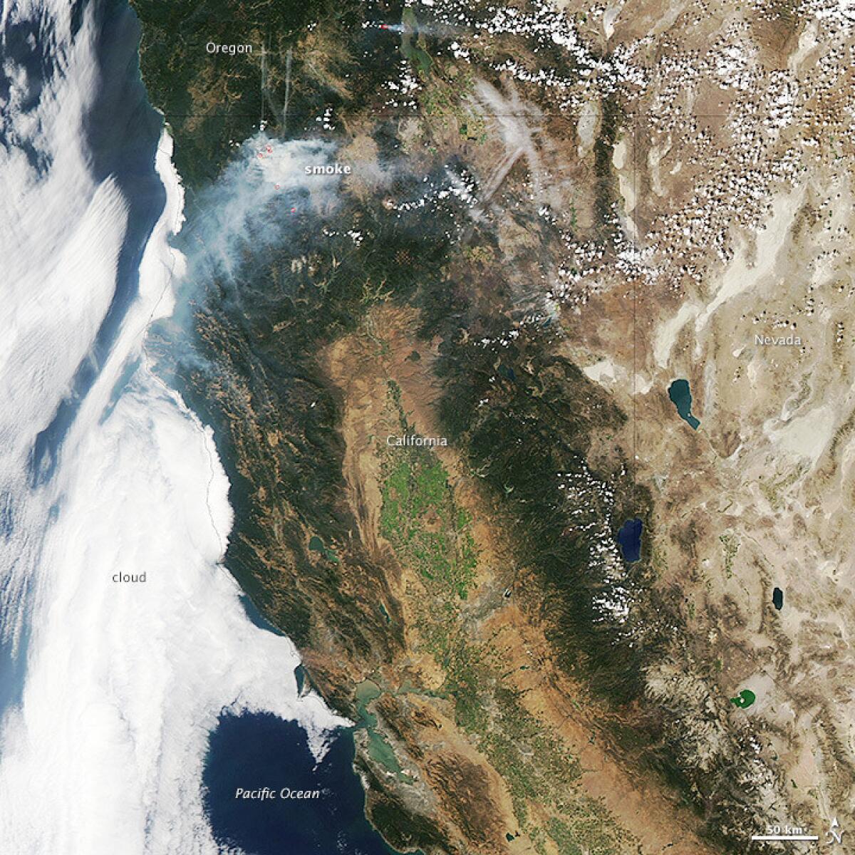 NASA satellite image of California shows the smoky effect of wildfires burning in the northern part of the state.