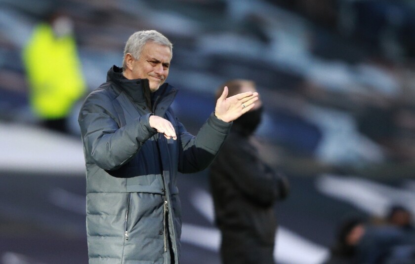 Tottenham's manager Jose Mourinho gives instructions from the side line during the English Premier League soccer match between Tottenham Hotspur and Leeds United at Tottenham Hotspur Stadium in London, England, Saturday, Jan. 2, 2021. (AP Photo/Ian Walton, Pool)