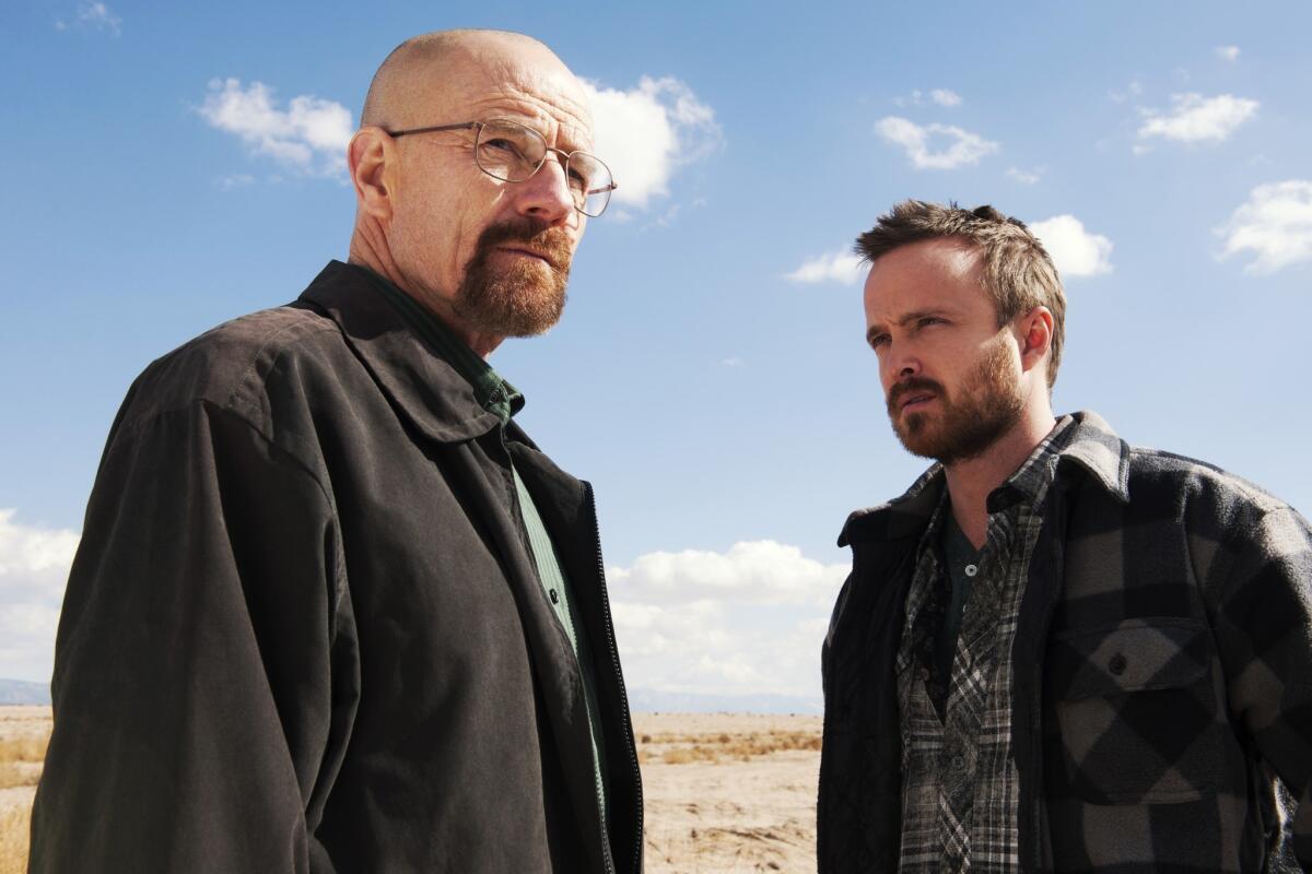 This image released by AMC shows Bryan Cranston as Walter White, left, and Aaron Paul as Jesse Pinkman in a scene from "Breaking Bad."