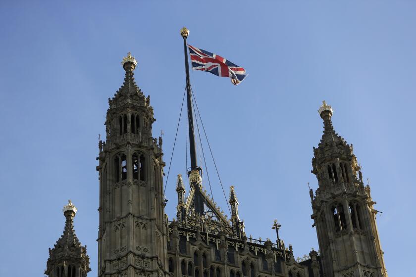 The Union flag flies above Britain's House of Lords, the upper house of the Parliament of the United Kingdom, in London, Thursday, Aug. 29, 2019. British Prime Minister Boris Johnson manoeuvred Wednesday to give his political opponents less time to block a no-deal Brexit split from Europe before the Oct. 31 withdrawal deadline, winning Queen Elizabeth II's approval to suspend Parliament. (AP Photo/Kirsty Wigglesworth)