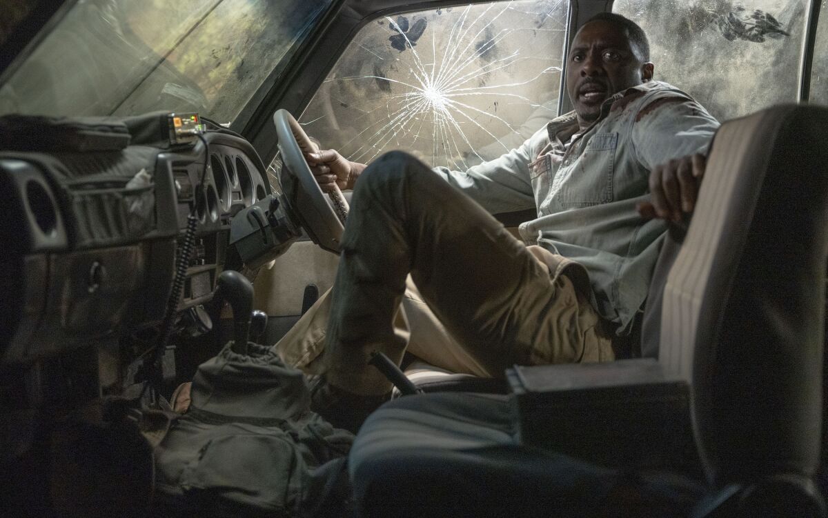 This image released by Universal Pictures shows Idris Elba in a scene from "Beast." (Lauren Mulligan/Universal Pictures via AP)