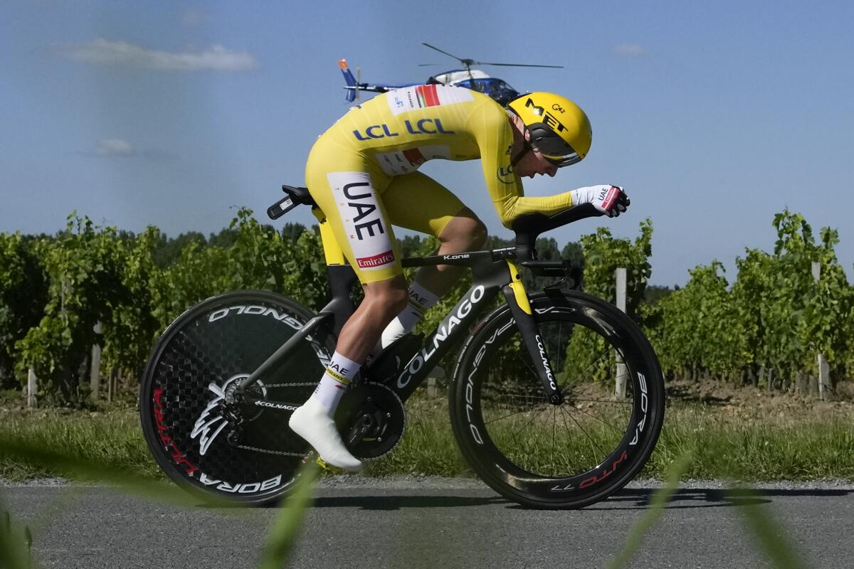 Tadej Pogacar races in the 20th stage of the Tour de France on Saturday.