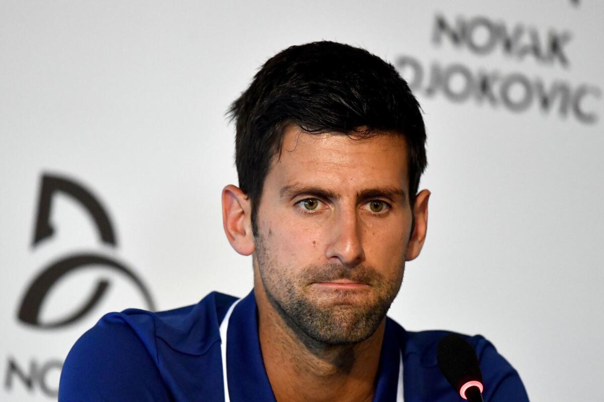 Novak Djokovic addresses the media in July about missing the rest of the 2017 season because of an elbow injury that is still bothering him heading into the new year.