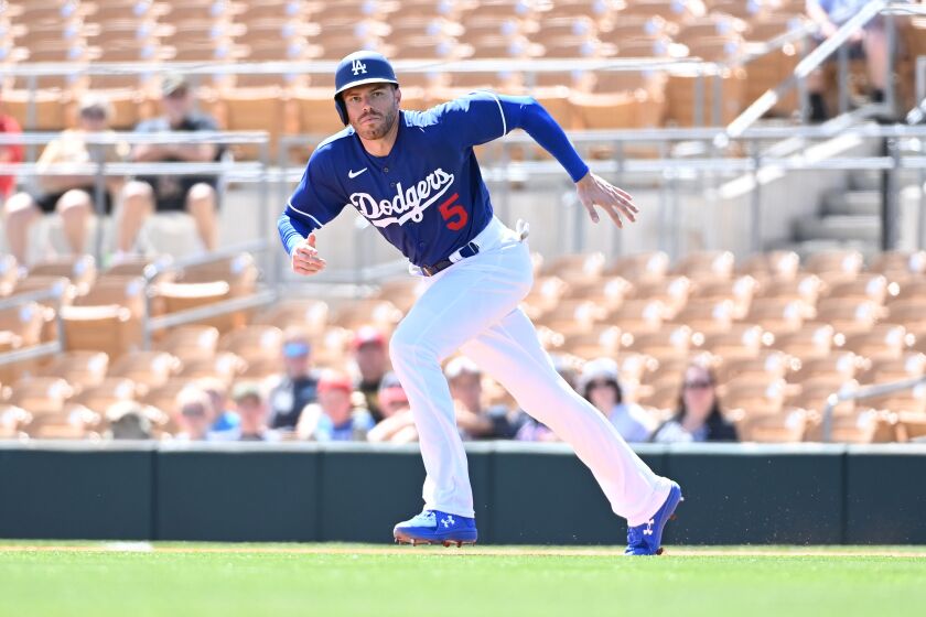 GLENDALE, ARIZONA - MARCH 22: Freddie Freeman #5 of the Los Angeles Dodgers runs to second base against the Cincinnati Reds during a spring training game at Camelback Ranch on March 22, 2022 in Glendale, Arizona. (Photo by Norm Hall/Getty Images)