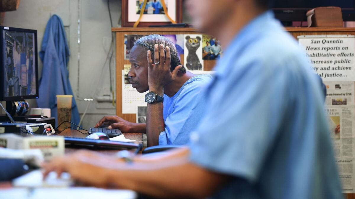 Richard Richardson, left, works on writing the obituary of his best friend Arnulfo Garcia.