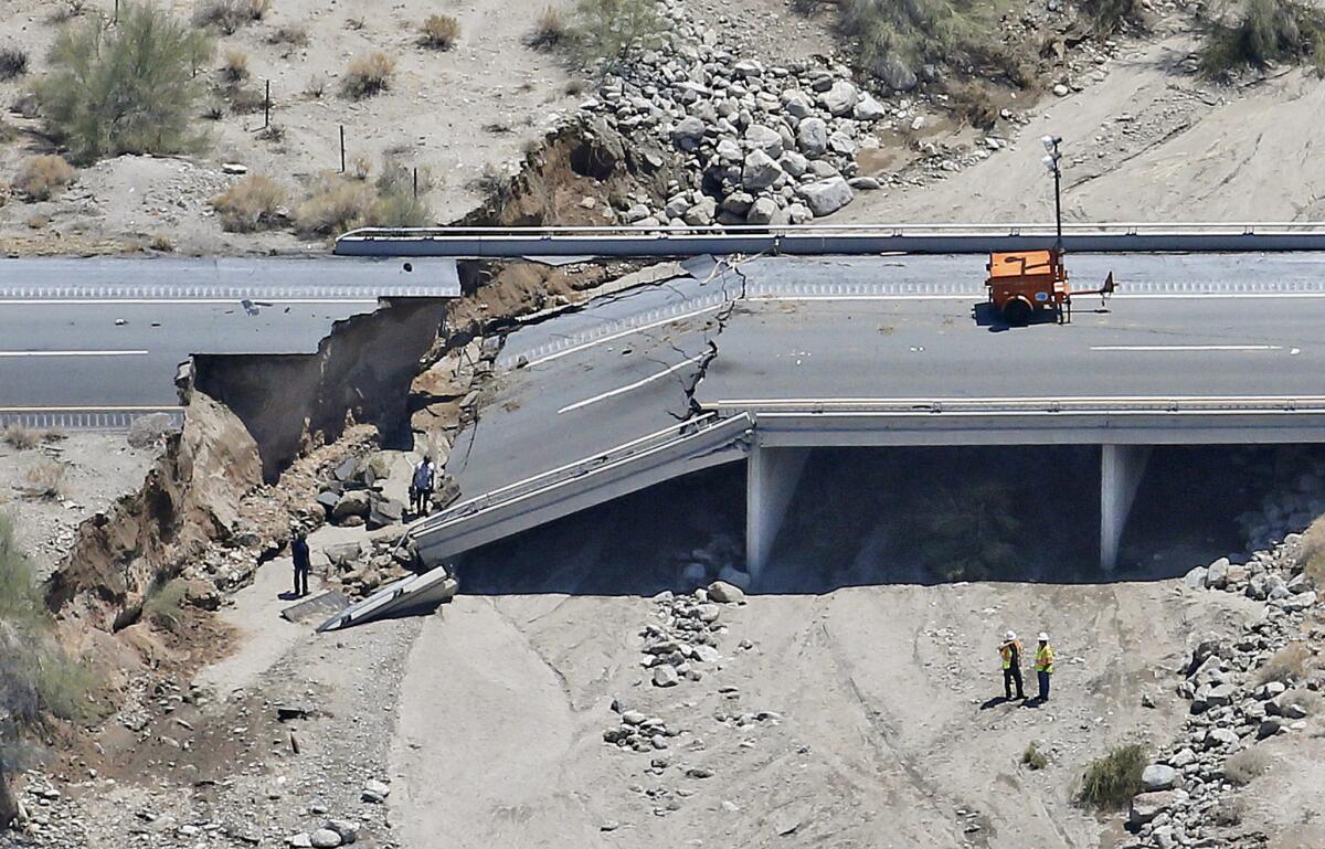 This aerial photo shows the collapsed section of Interstate 10 on Monday in Desert Center, Calif.