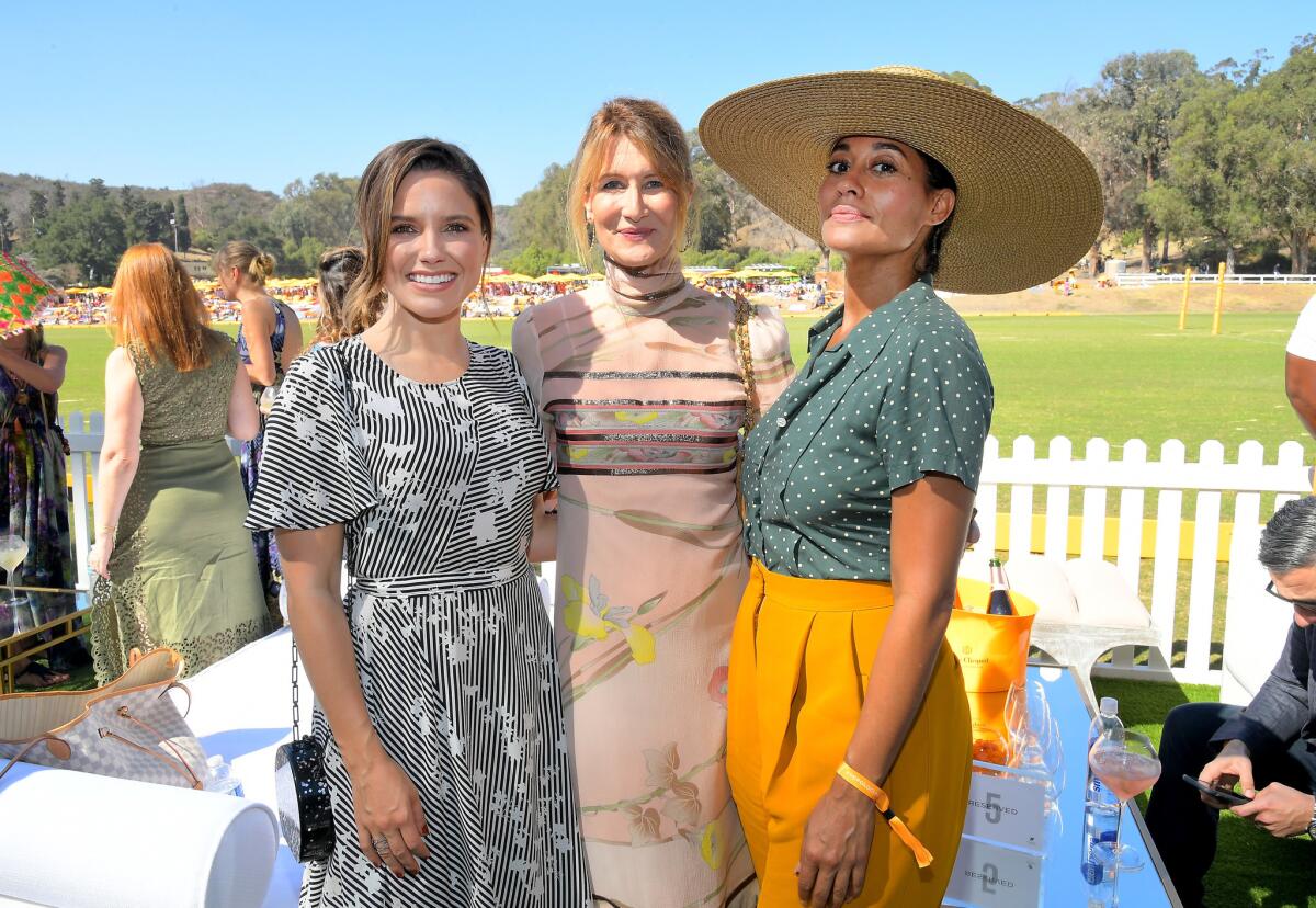 Sophia Bush, left, Laura Dern and Tracee Ellis Ross at the eighth annual Veuve Clicquot Polo Classic on Saturday at the Will Rogers State Historic Park in the Pacific Palisades.