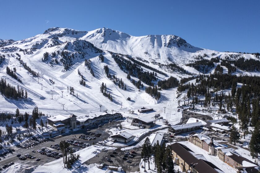 MAMMOTH LAKES, CA - October 27 2021: Aerial view of Mammoth Mountain on Wednesday, Oct. 27, 2021 in Mammoth Lakes, CA. The ski resort will open two weeks earlier than scheduled thanks to recent snow storms. (Brian van der Brug / Los Angeles Times)