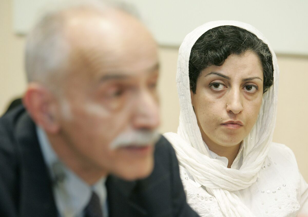 Narges Mohammadi, right, attends a news conference in Geneva in 2008.