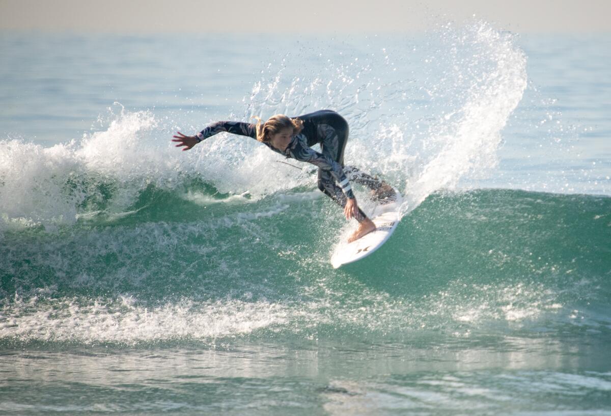 Sara Freyre of Huntington Beach cuts back into a wave during November training with the USA Surfing Junior National Team.