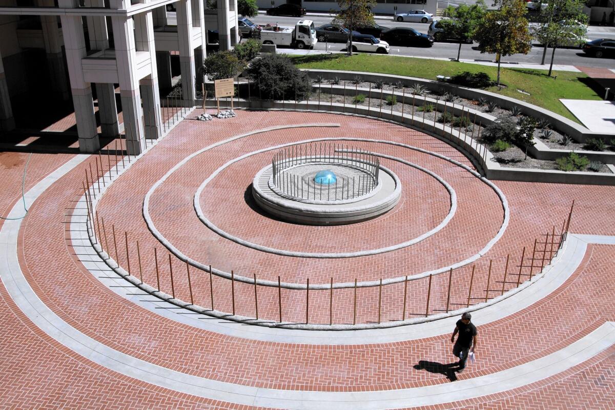 A new art installation called "Water Finds a Way" has been placed at Perkins Plaza in Glendale.