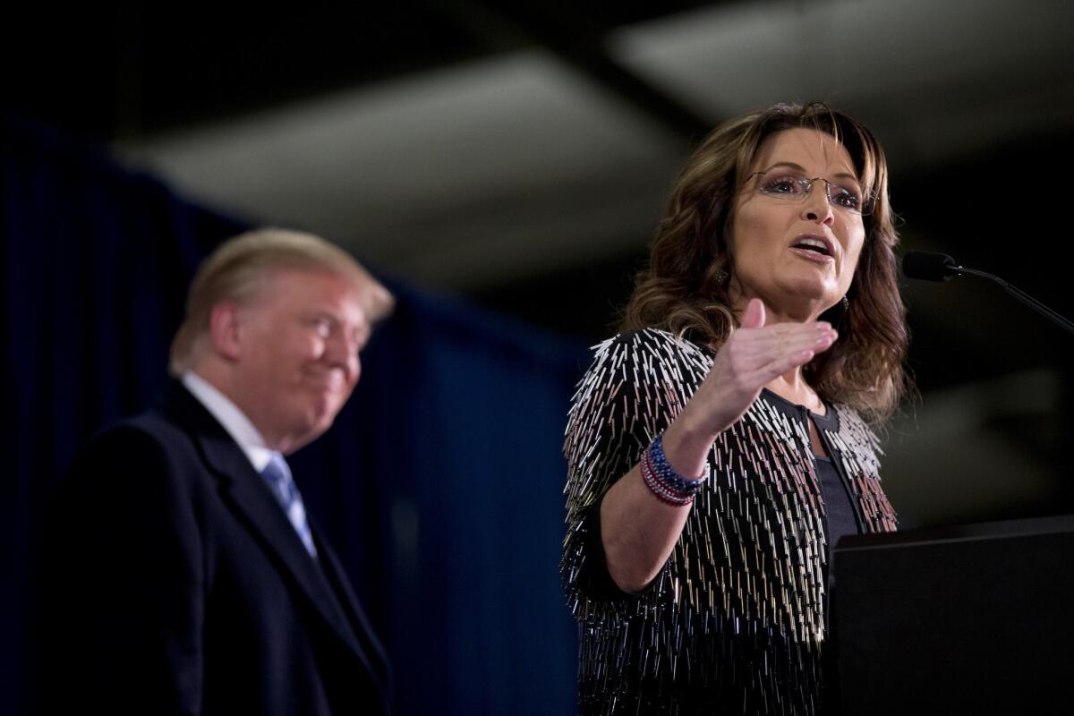 Former Alaska Gov. Sarah Palin endorses Republican presidential candidate Donald Trump during a rally in Ames, Iowa, on Jan. 19.