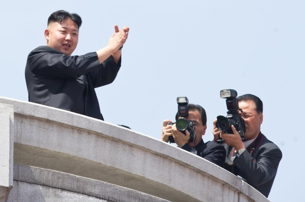 North Korean leader Kim Jong-Un -- the Onion's "Sexiest Man Alive" -- attends a military parade in Pyongyang.